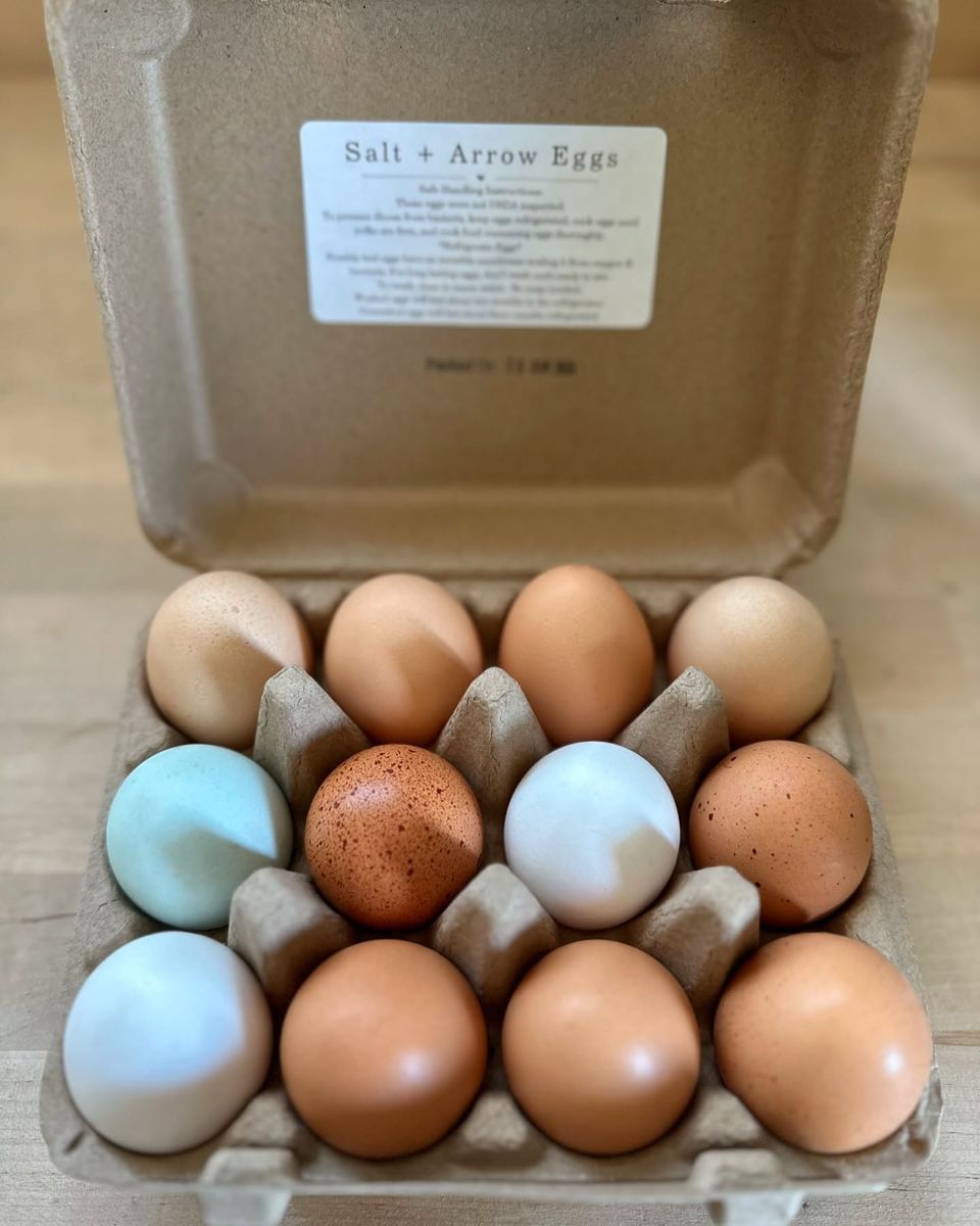 A carton of blue, brown and speckled pastured eggs