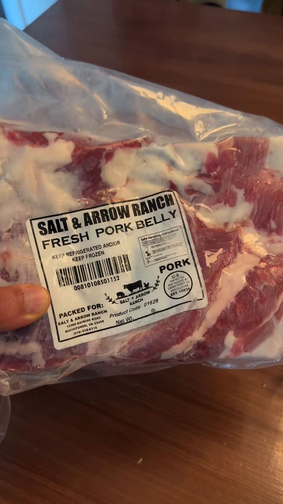 Packaged fresh pork belly with the Salt + Arrow Ranch label